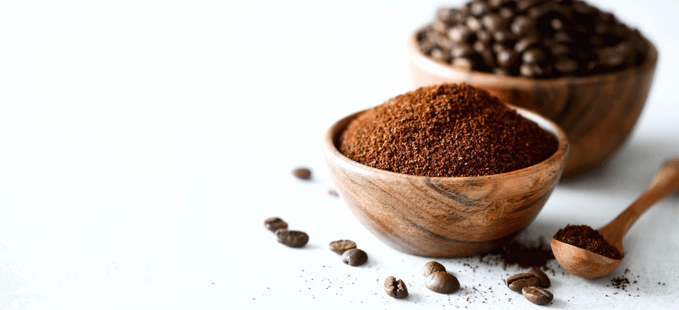  ground coffee and coffee beans in a bowl