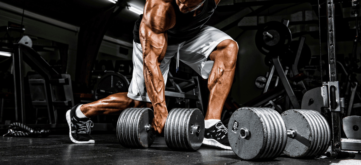 man on the gym with heavy weights